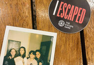 A polaroid photo of family attending an escape room in Los Angeles