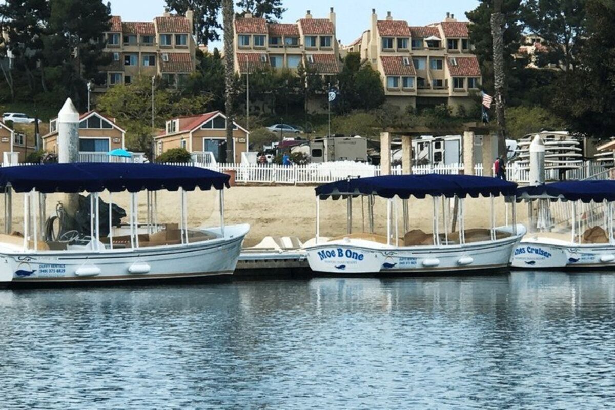 Three duffy boats waiting to go out into the lagoon.